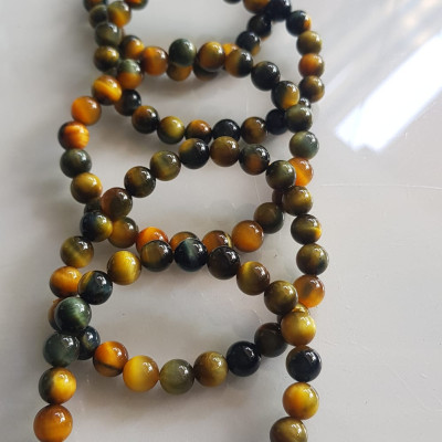 Vòng tay phong thủy may mắn Nữ đá mắt hổ tự nhiên vàng xanh đều mới bóng mượt đẹp Size hạt 8mm Nữ đeo Công dụng vòng đá mắt hổ đá thiên nhiên tốt cho sức khỏe, đem đến may mắn,xoa dịu tâm trí công việc hanh thông ạ