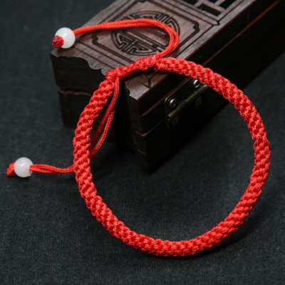 Vòng tay nam nữ bện chỉ đỏ tròn đính 2 hạt ngọc CD19