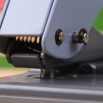 DKJ7703	Đục 2 lỗ 35 tờ Guangbo