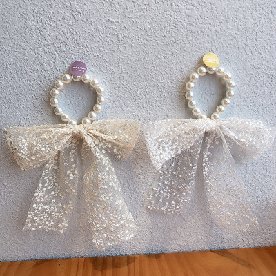 Dây buộc tóc nơ ren dây ngọc sang chảnh HD139