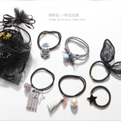 Set dây buộc tóc cao cấp xuất Nhật HD18 kiểu nơ đính trăng sao đựng trong túi lưới