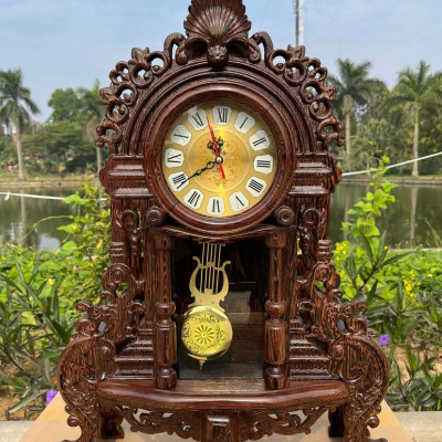 Đồng hồ quả lắc để bàn tân cổ điển bằng gỗ mun đuôi công kt cao 70×45×15cm + chân đế cao 15×52×29cm