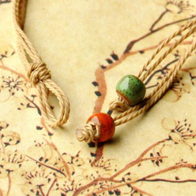 Vòng tay gốm thời trang sắc màu 3 dây hạt tròn VGOM32 